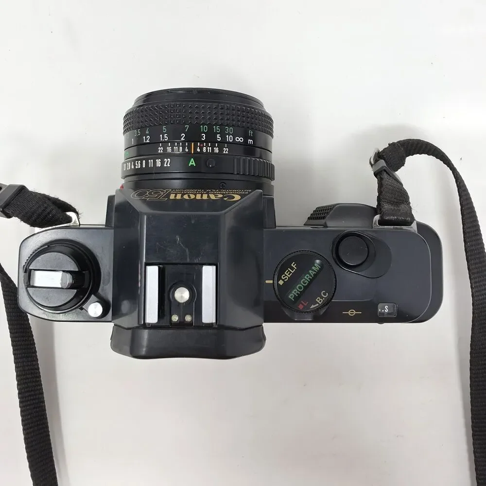 Canon T50 35mm SLR Film Camera with Canon FD 50mm 1:1.8 Lens Tested Working